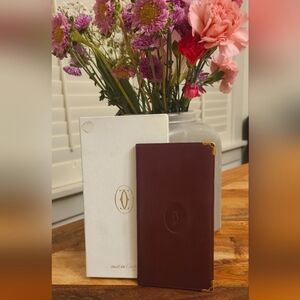 Cartier Bordeaux leather bi-fold wallet L3000117 comes with Zippered Coin Pouch